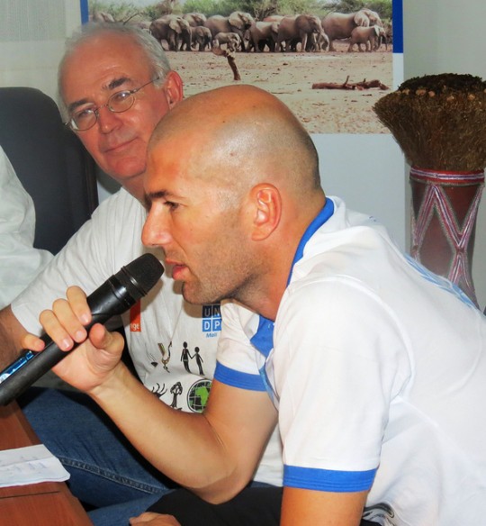 Zidane participates to a press conference with UNDP's acting Resident Representative Maurice Dewulf (left). Photo: A. Poltier/UNDP  