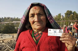 The United Nations provided technical assistance to elections in Nepal.The woman in the photogrph has walked over an hour and a half to cast her ballot. Photo Credit: UN/Nayan Tara