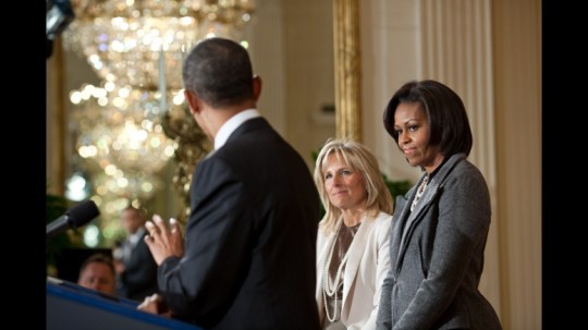 First Lady Michelle Obama and Dr. Jill Biden listen as President Barack Obama unveils efforts to better coordinate and strengthen the federal government’s support for military families in the East Room of the White House, Jan. 24, 2011. (Official White House Photo by Pete Souza)