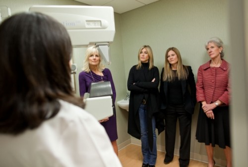 Dr. Jill Biden, along with Jennifer Aniston, Kristin Hahn, and Secretary of Health and Human Services Kathleen Sebelius, listens to Dr. Constanza Cocilovo during a tour of the Inova Breast Care Center in Alexandria, Va., Oct. 3, 2011. (Official White House Photo by Chuck Kennedy)